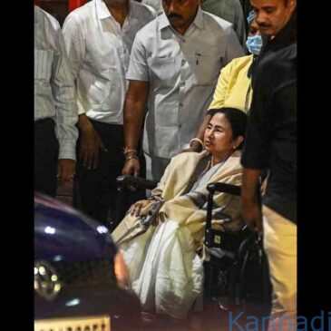 ಹೆಲಿಕಾಪ್ಟರ್ ಲ್ಯಾಂಡಿಂಗ್ ವೇಳೆ ಗಾಯಗೊಂಡ ನಂತರ ವೈದ್ಯರ ಸಲಹೆ ಧಿಕ್ಕರಿಸಿ ಗಾಲಿಕುರ್ಚಿಯಲ್ಲಿ ಆಸ್ಪತ್ರೆಯಿಂದ ಹೊರನಡೆದ ಮಮತಾ ಬ್ಯಾನರ್ಜಿ